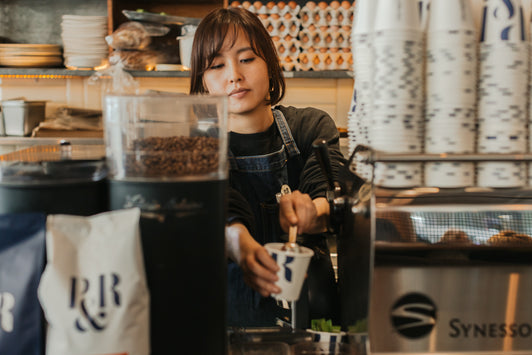 Why do cafes find it hard to raise prices?